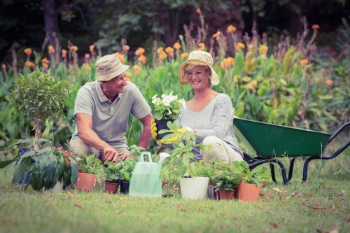 Gardener working in a Turnham Green garden, preparing to start work