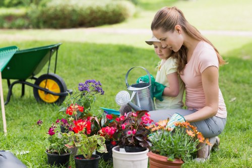 Person using a screen reader device while viewing gardening information.